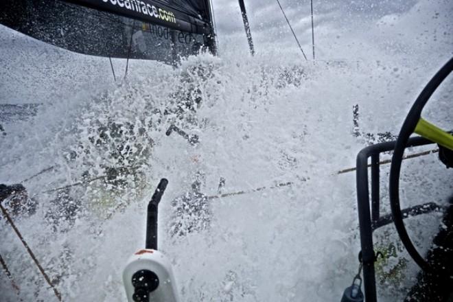 Team Brunel - A wave pours over the deck - Volvo Ocean Race 2014-15 © Stefan Coppers/Team Brunel